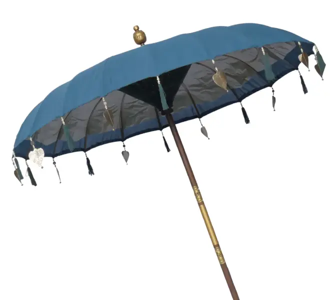 Product image of the product “Bali umbrella, Blue 2 with wooden coins and gold leaves hanging around the edge. Approx. 190cm dia. and 250cm height ”